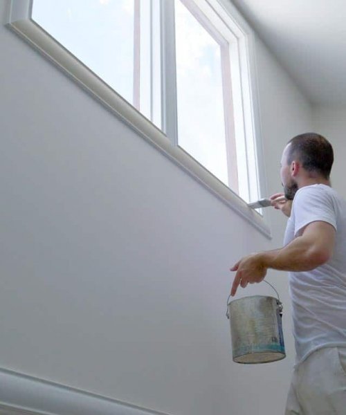 Paint white window inside a house